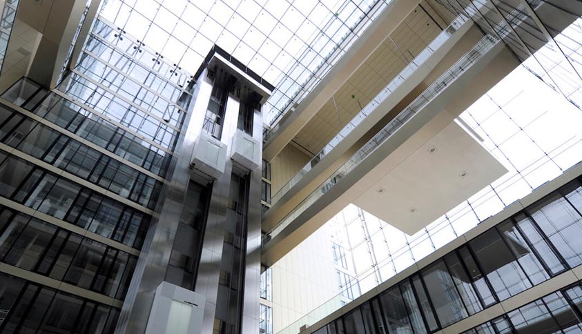 What should be paid attention to when riding escalators and moving walks safely